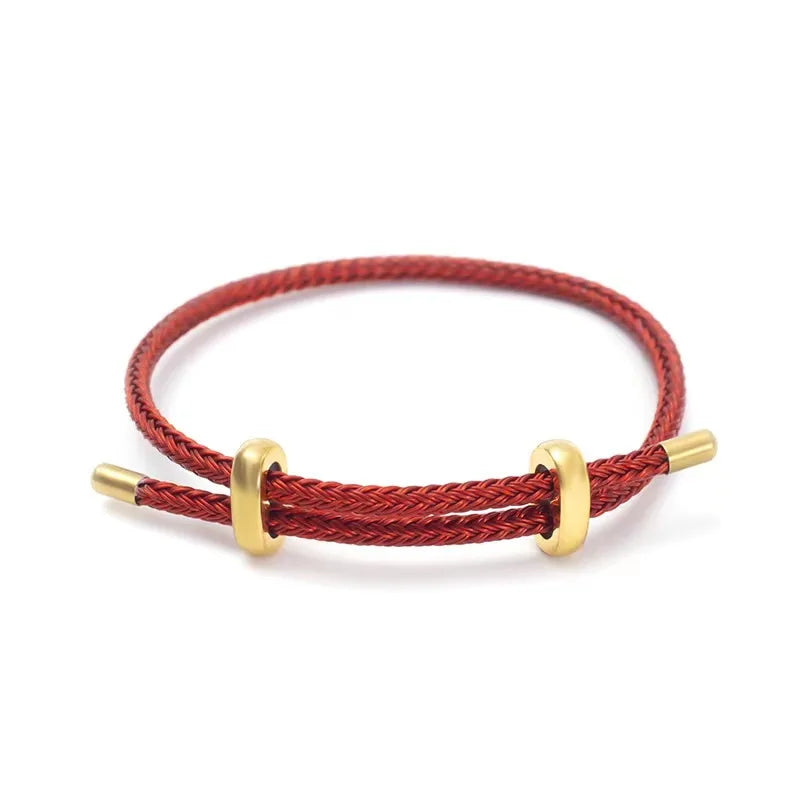 Pulsera trenzada ajustable con dije de acero inoxidable – Joya elegante y apilable para mujer